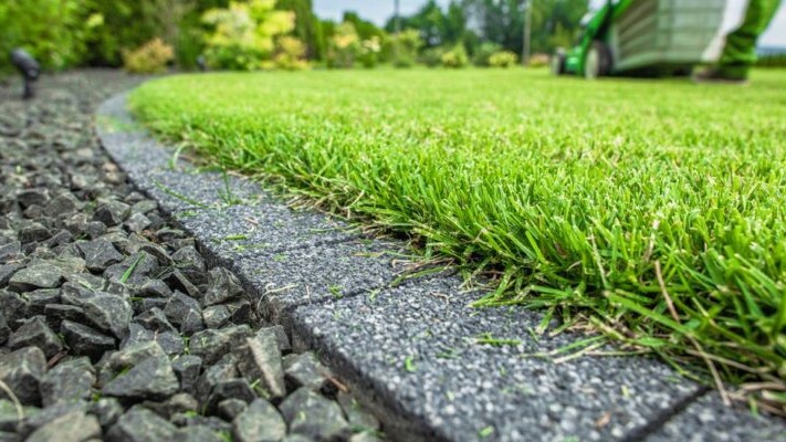 Artificial grass with stone edging