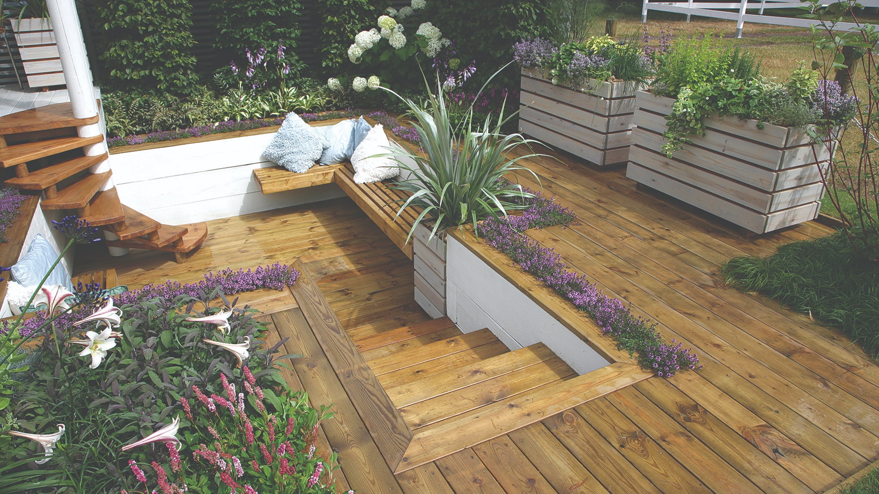 Timber decking with steps to garden